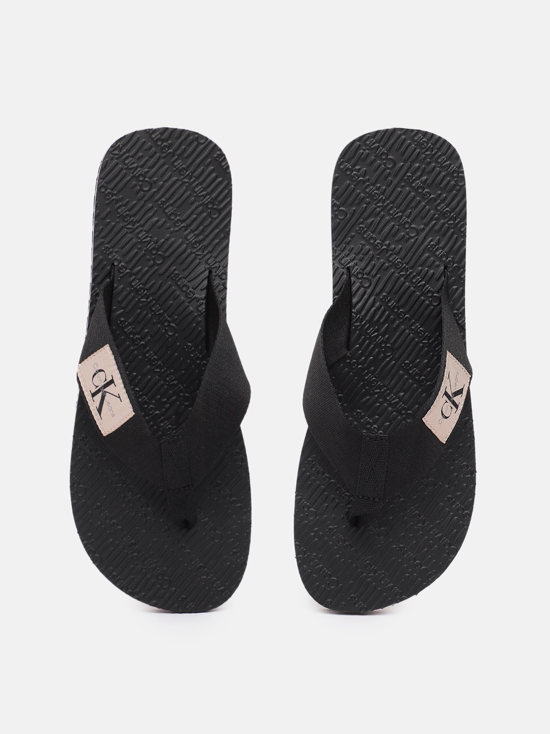 

Calvin Klein Men Solid Thong Flip-Flops With Brand Logo Applique Detail, Black