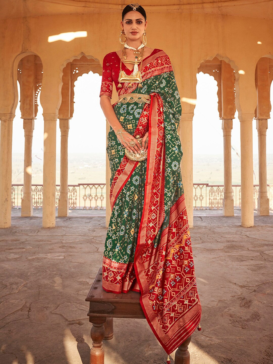 

Anouk Green & Red Ethnic Woven Design Zari Patola Saree