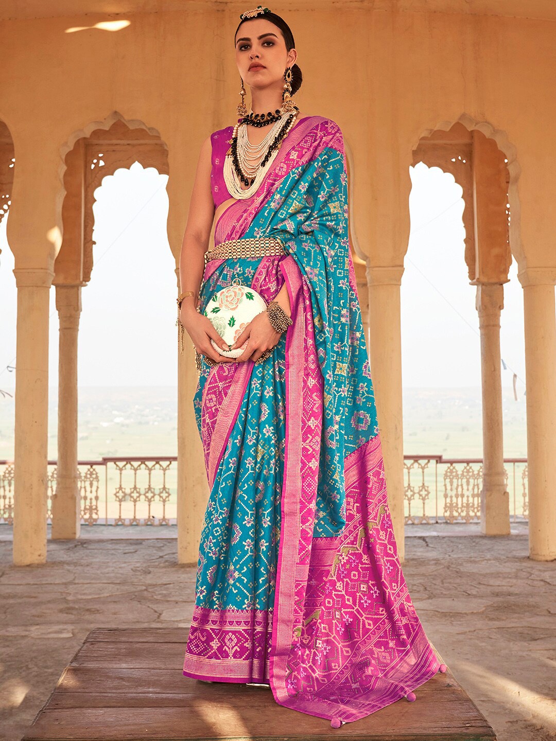 

Anouk Blue & Pink Ethnic Woven Design Zari Patola Saree