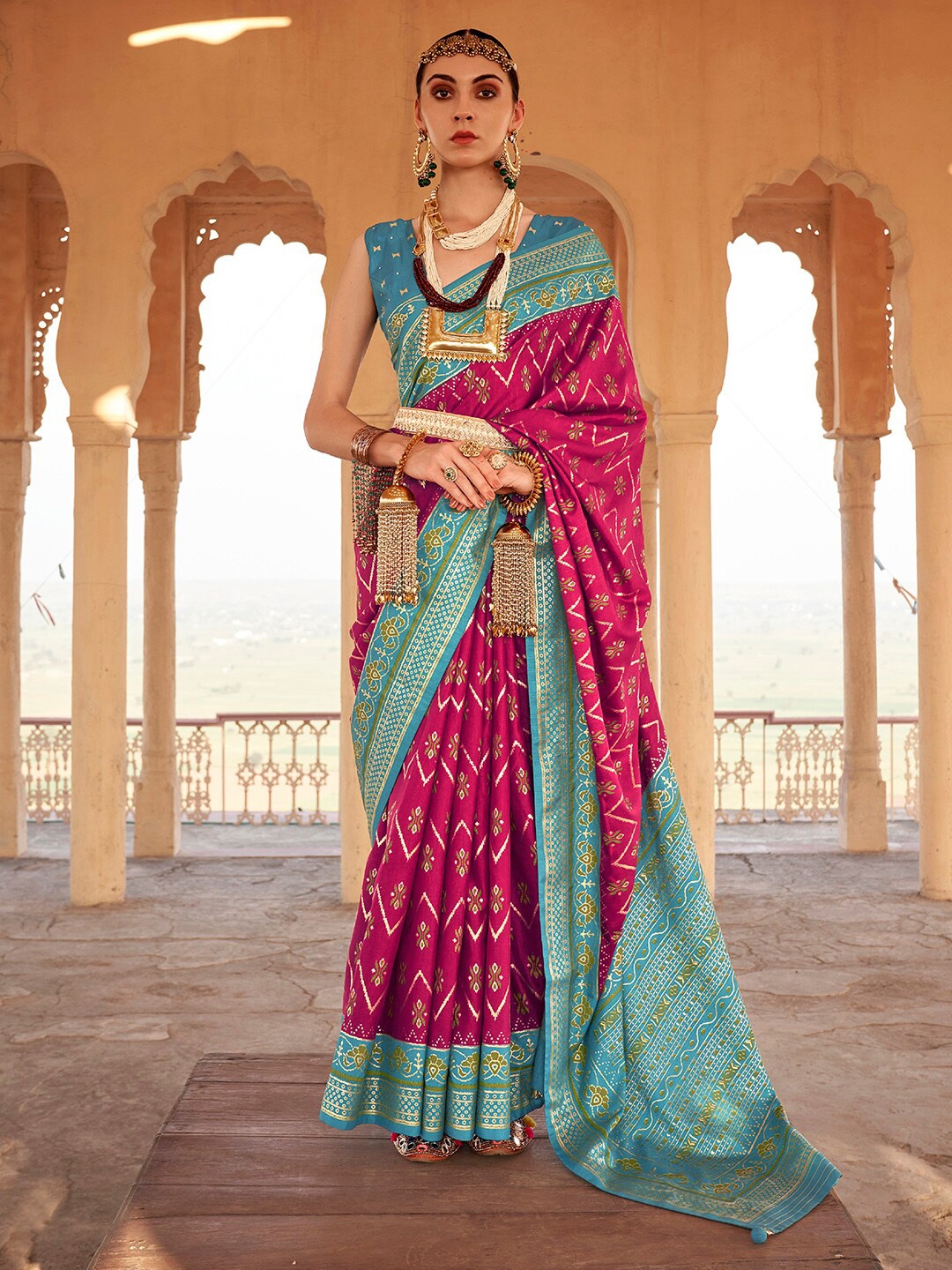 

Anouk Pink & Blue Ethnic Woven Design Zari Patola Saree