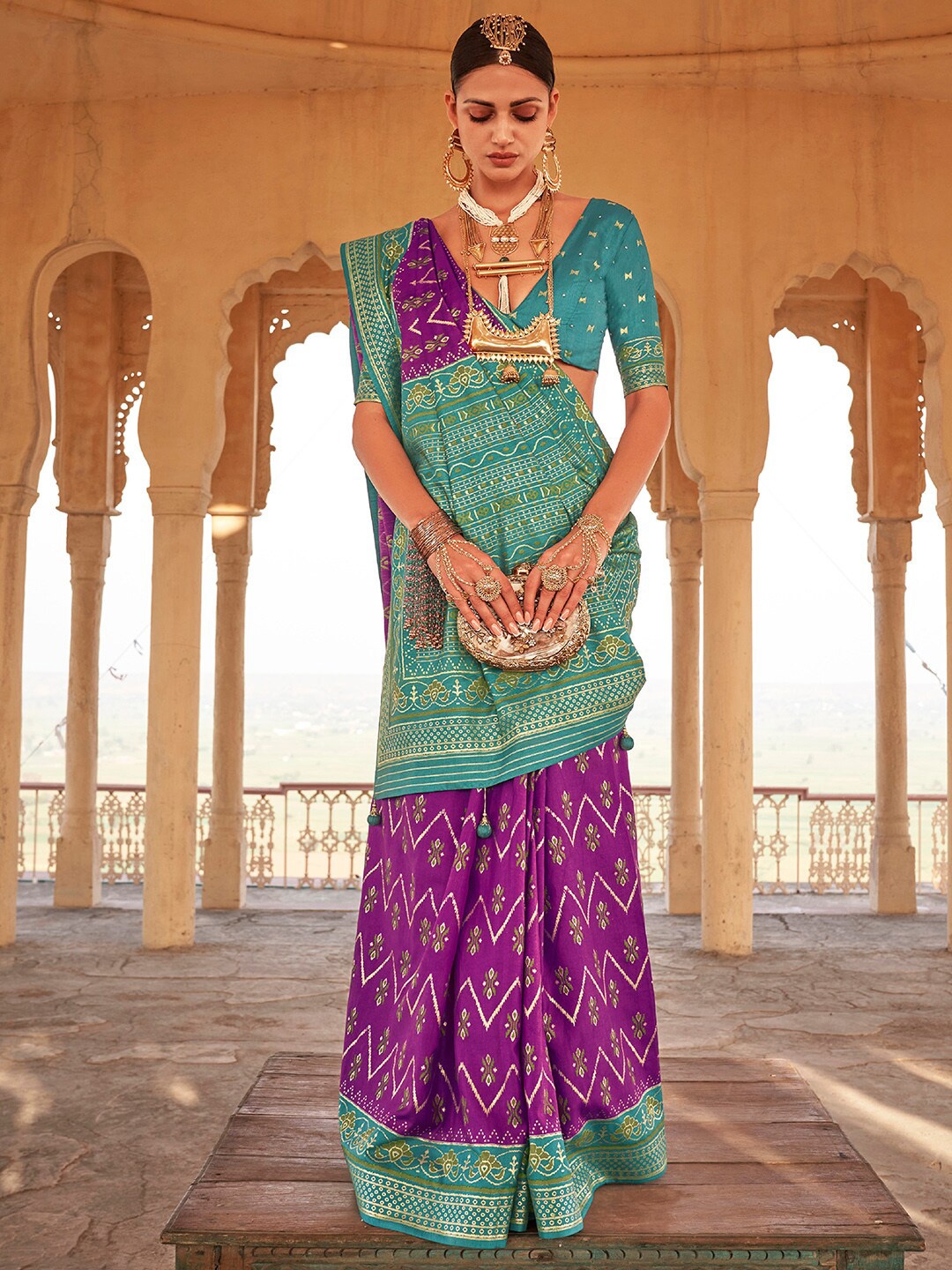 

Anouk Purple & Blue Ethnic Woven Design Zari Patola Saree