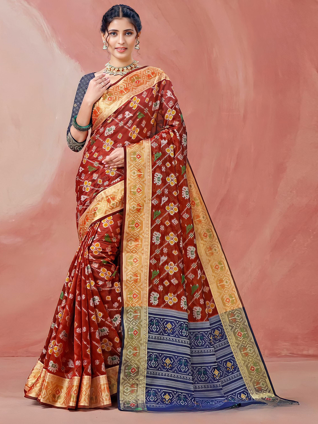 

Mitera Red & Gold-Toned Ethnic Motif Woven Design Zari Organza Patola Saree