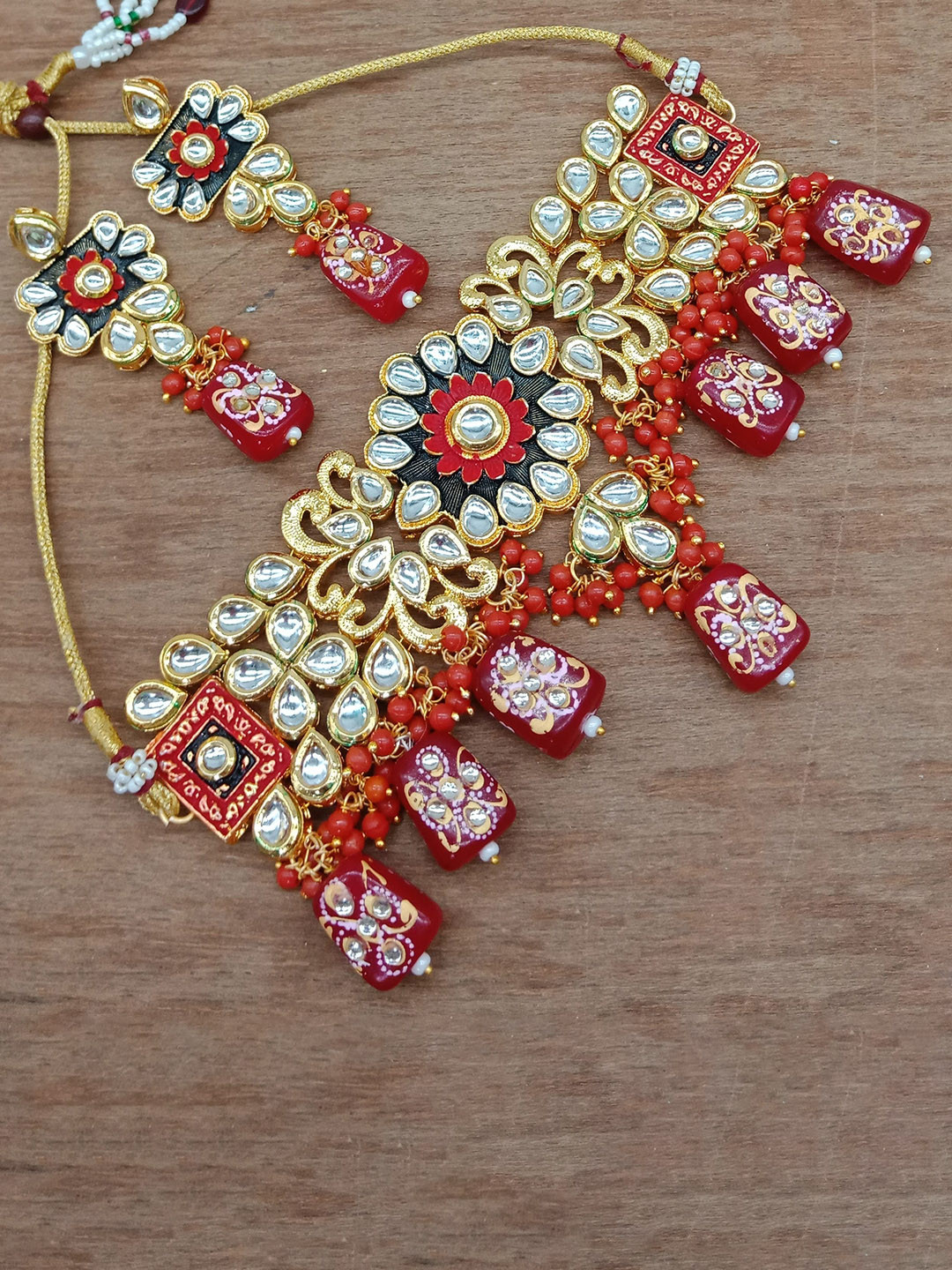 

AASHISH IMITATION Gold-Plated Red Kundan Jaipuri Jewellery Set