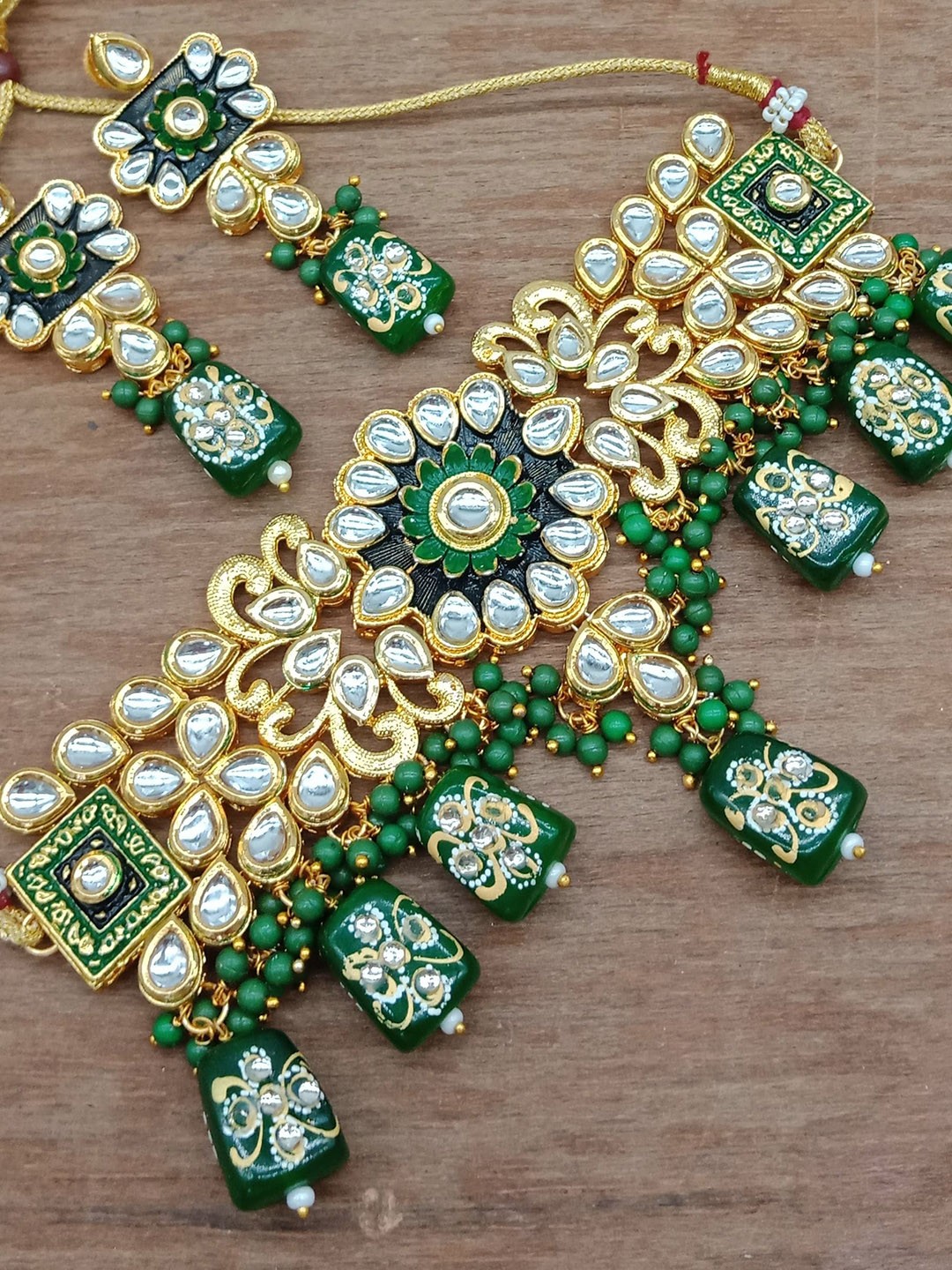 

AASHISH IMITATION Gold -Plated Polki Kundan Jaipuri Drop Jewellery Set