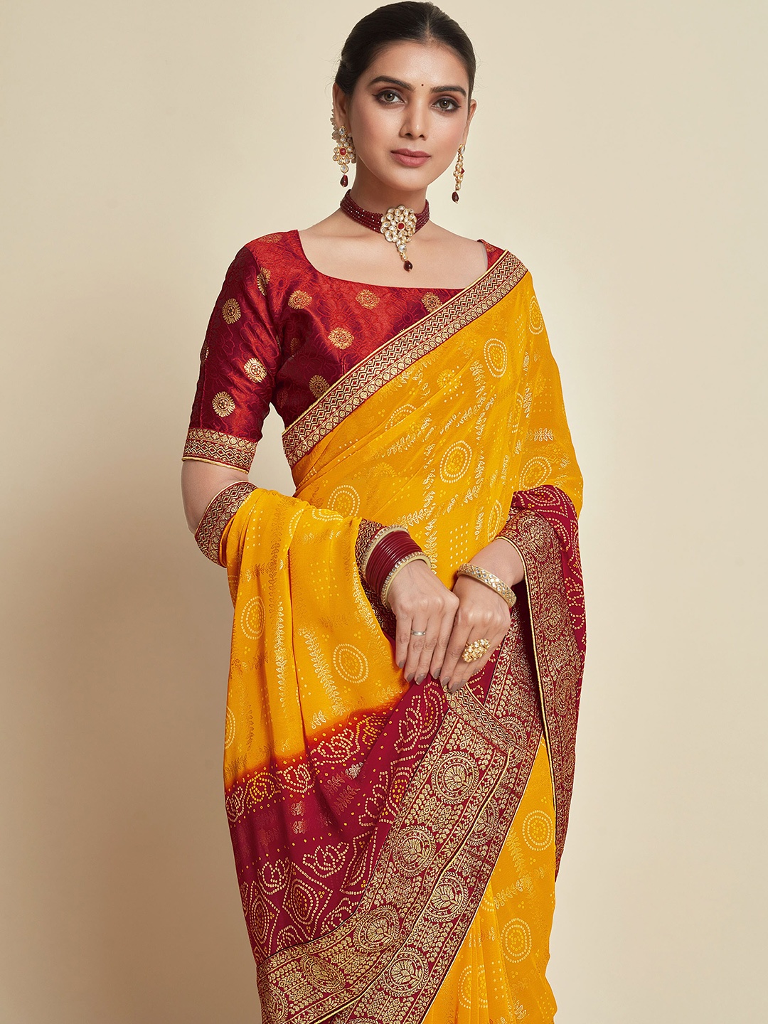 

Sangria Yellow Bandhani Printed Saree
