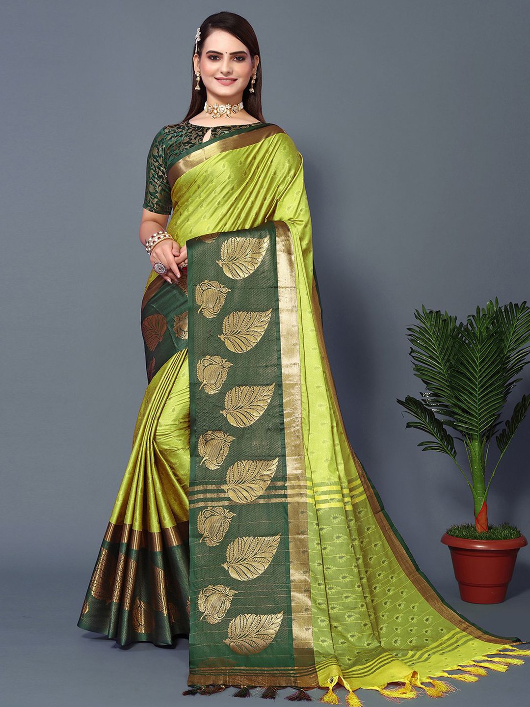 

Mitera Yellow & Green Woven Design Zari Silk Cotton Saree