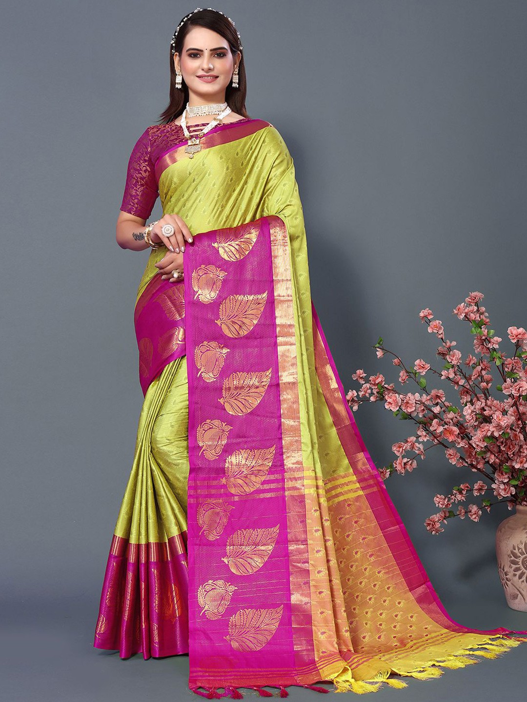

Mitera Green & Purple Woven Design Zari Silk Cotton Saree