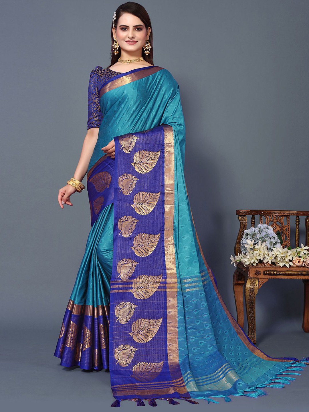 

Mitera Turquoise Blue & Gold-Toned Woven Design Zari Silk Cotton Saree