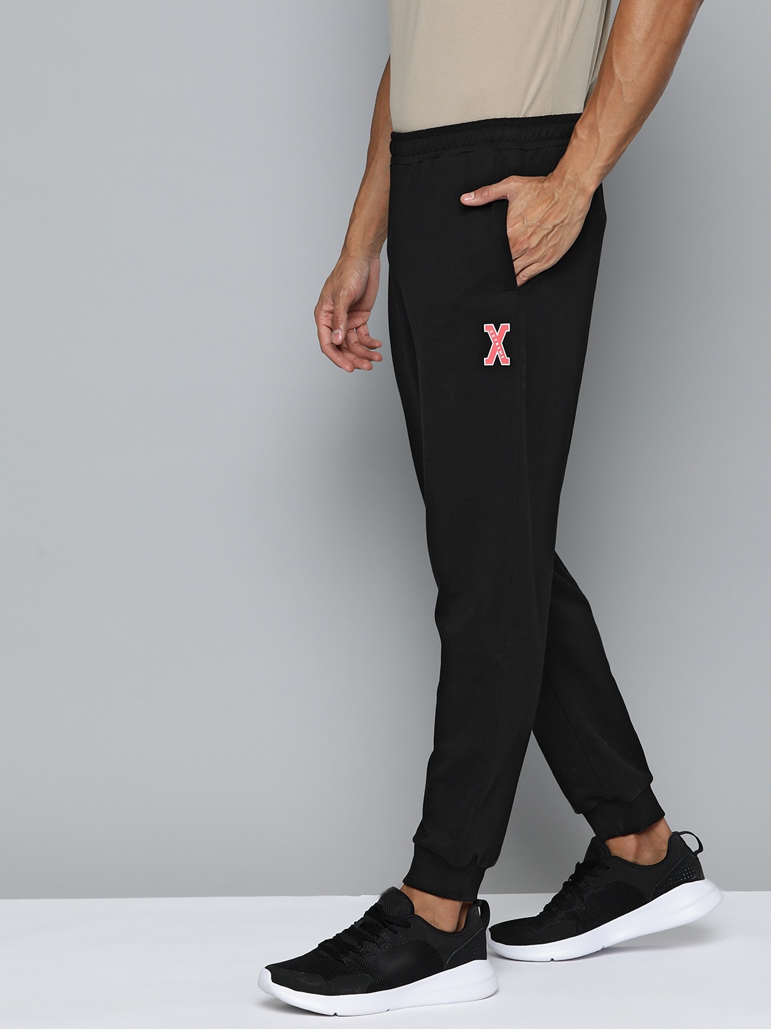 

HRX by Hrithik Roshan Men Solid Joggers, Black