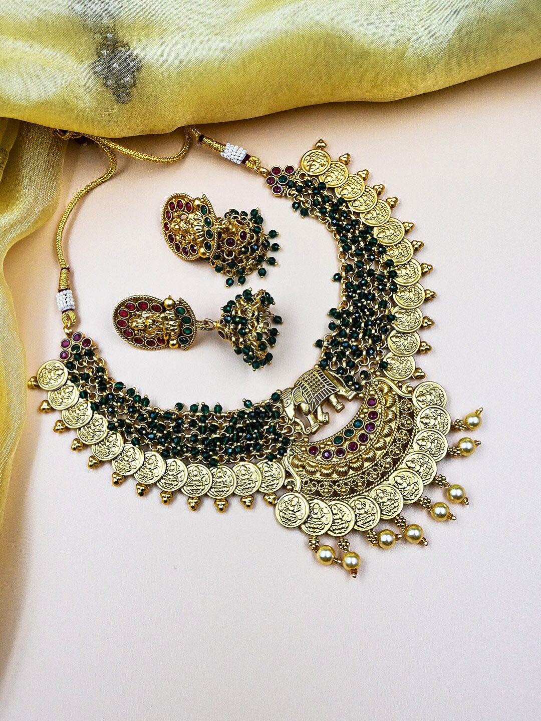 

StileAdda Gold-Plated & Green Stone Studed & Beaded Temple Necklace Set