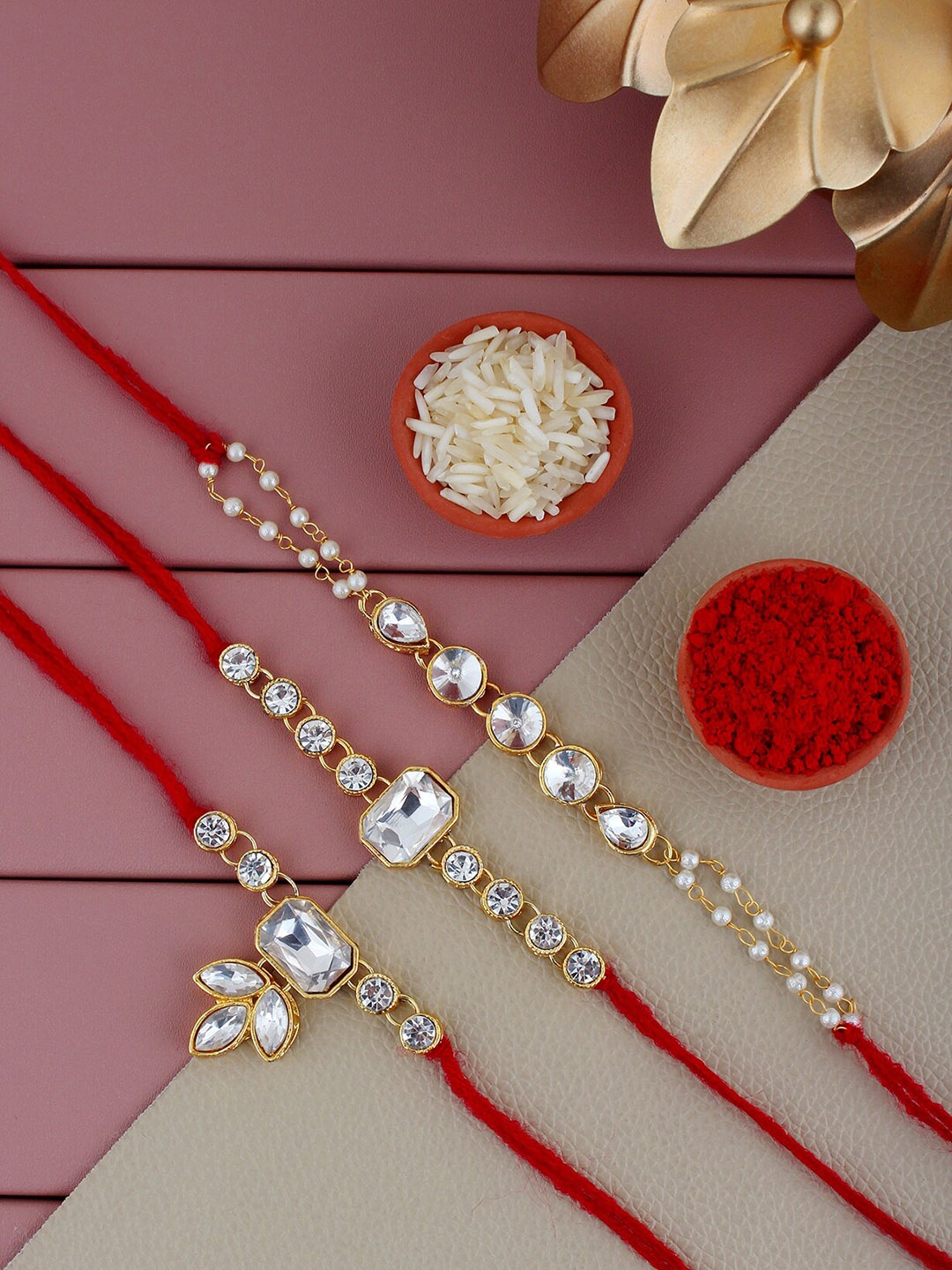 

LUCKY JEWELLERY Set Of 3 Stones Studded Rakhi With Roli Chawal & Card, Red