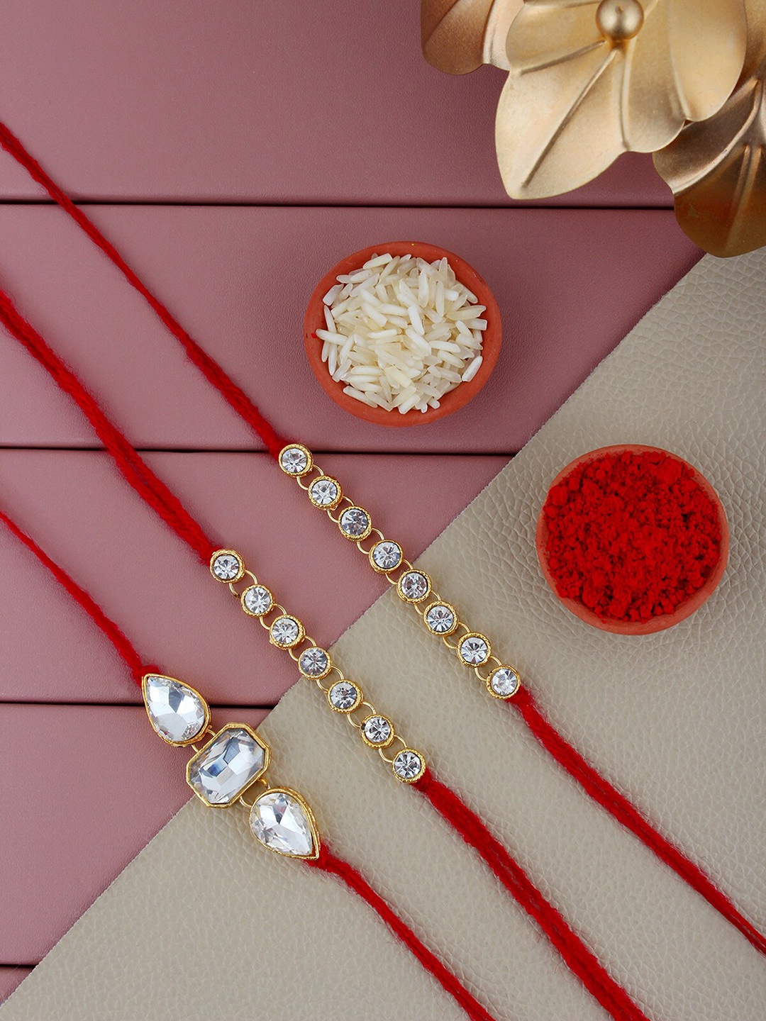 

LUCKY JEWELLERY Set Of 3 Stones Studded Rakhi With Roli Chawal & Card, Gold