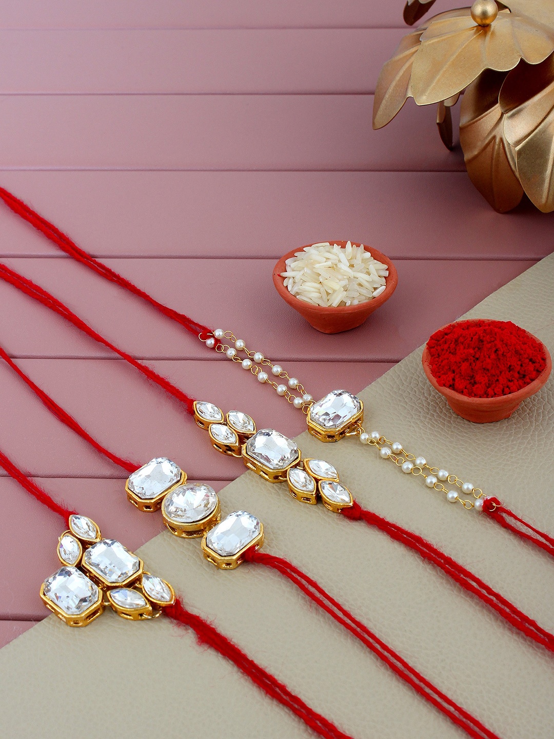 

LUCKY JEWELLERY Set Of 4 Stones Studded Rakhi With Roli Chawal & Card, Gold