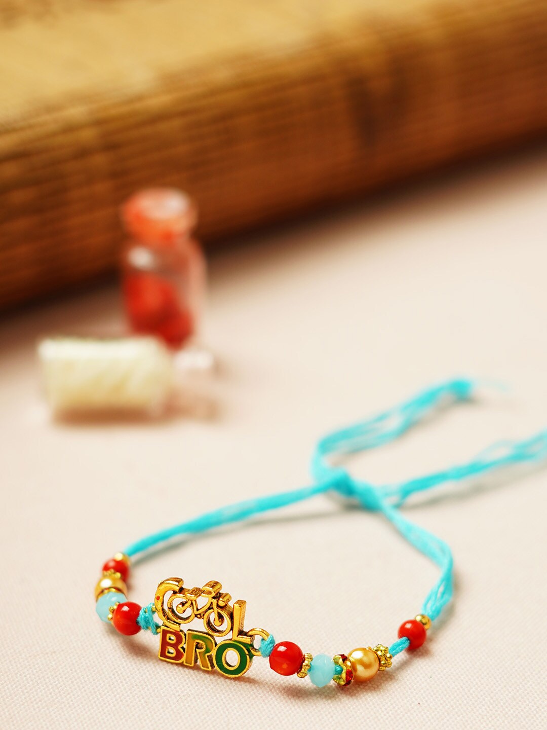 

Ferosh Cool Bro Cycle Motif Quirky Rakhi, Turquoise blue