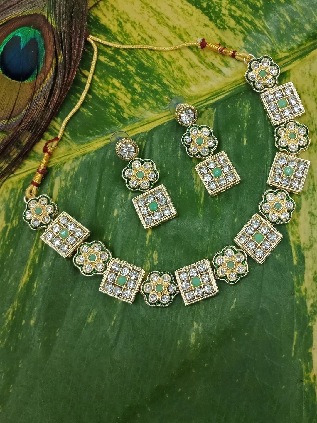 

AASHISH IMITATION Gold-Plated Studded & Beaded Jewellery Set