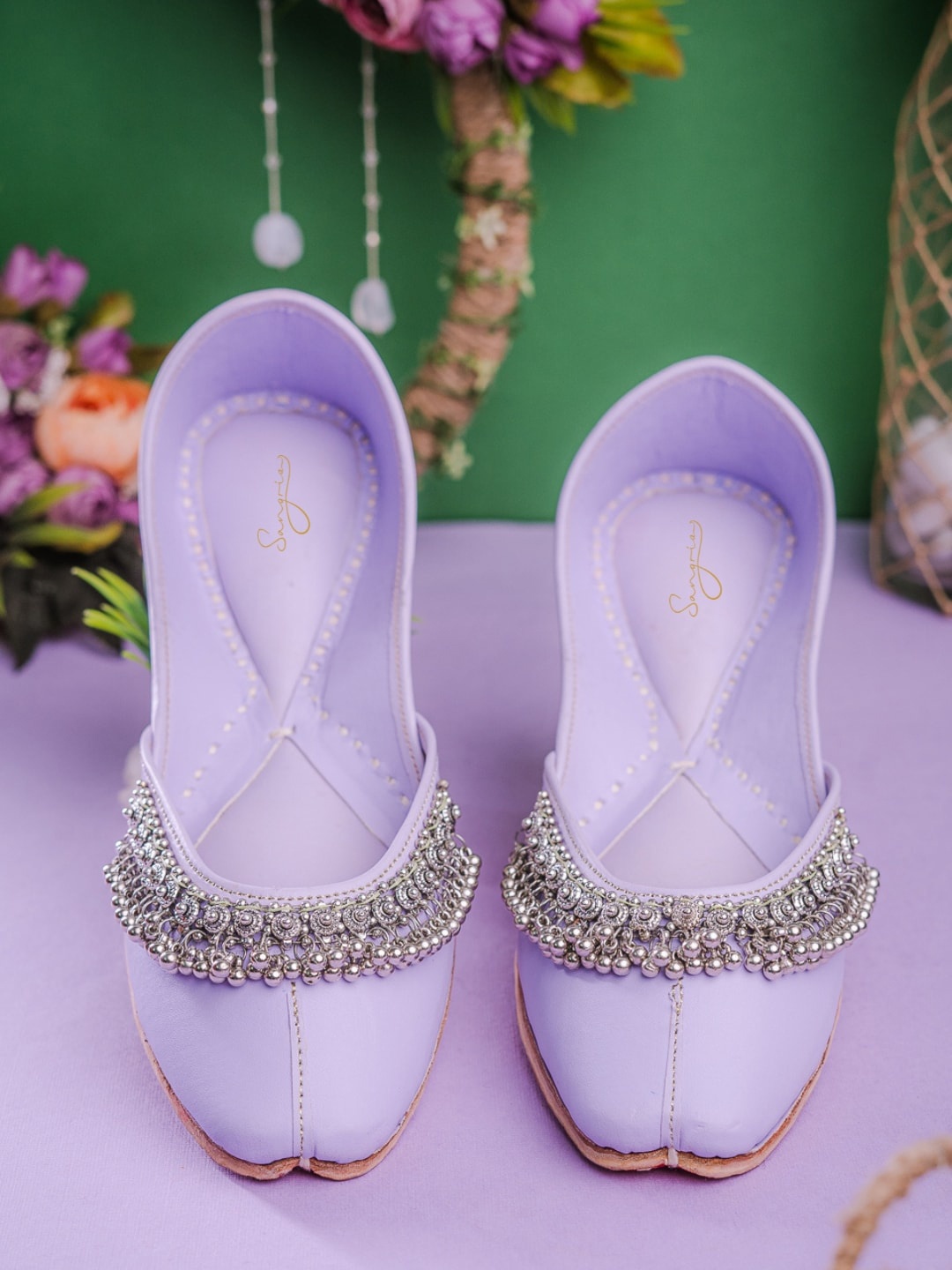 

Sangria Lavender And Silver-Toned Embellished Ethnic Mojaris