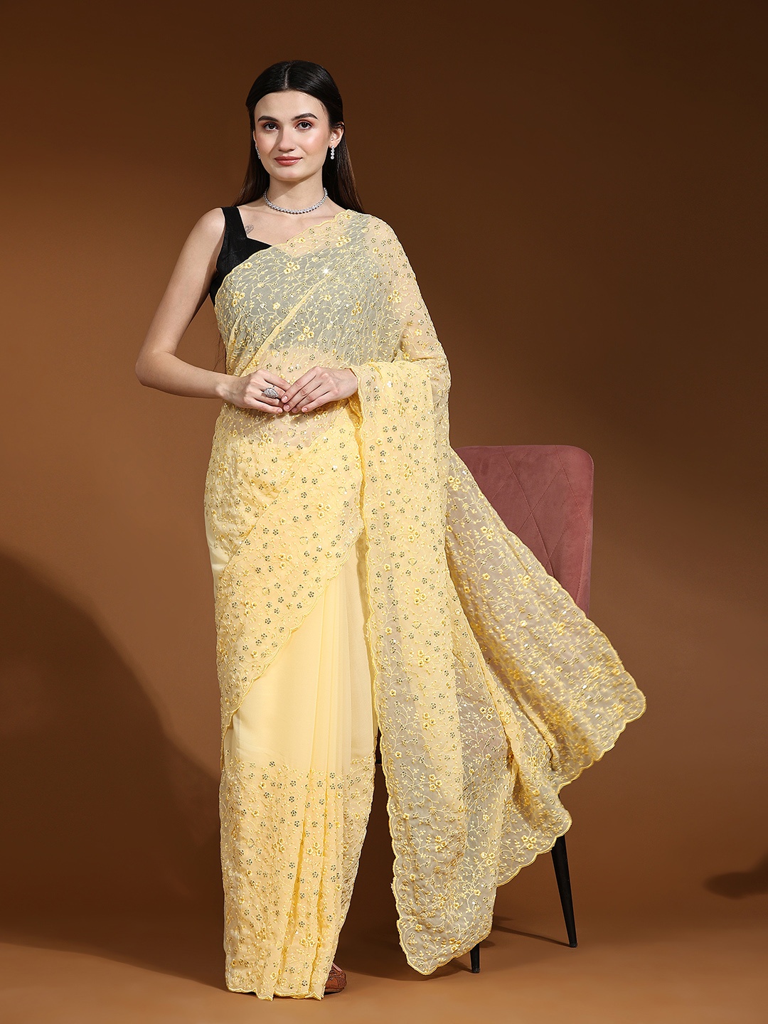 

Vastrasky Global Floral Embroidered Sequinned Pure Georgette Saree, Yellow
