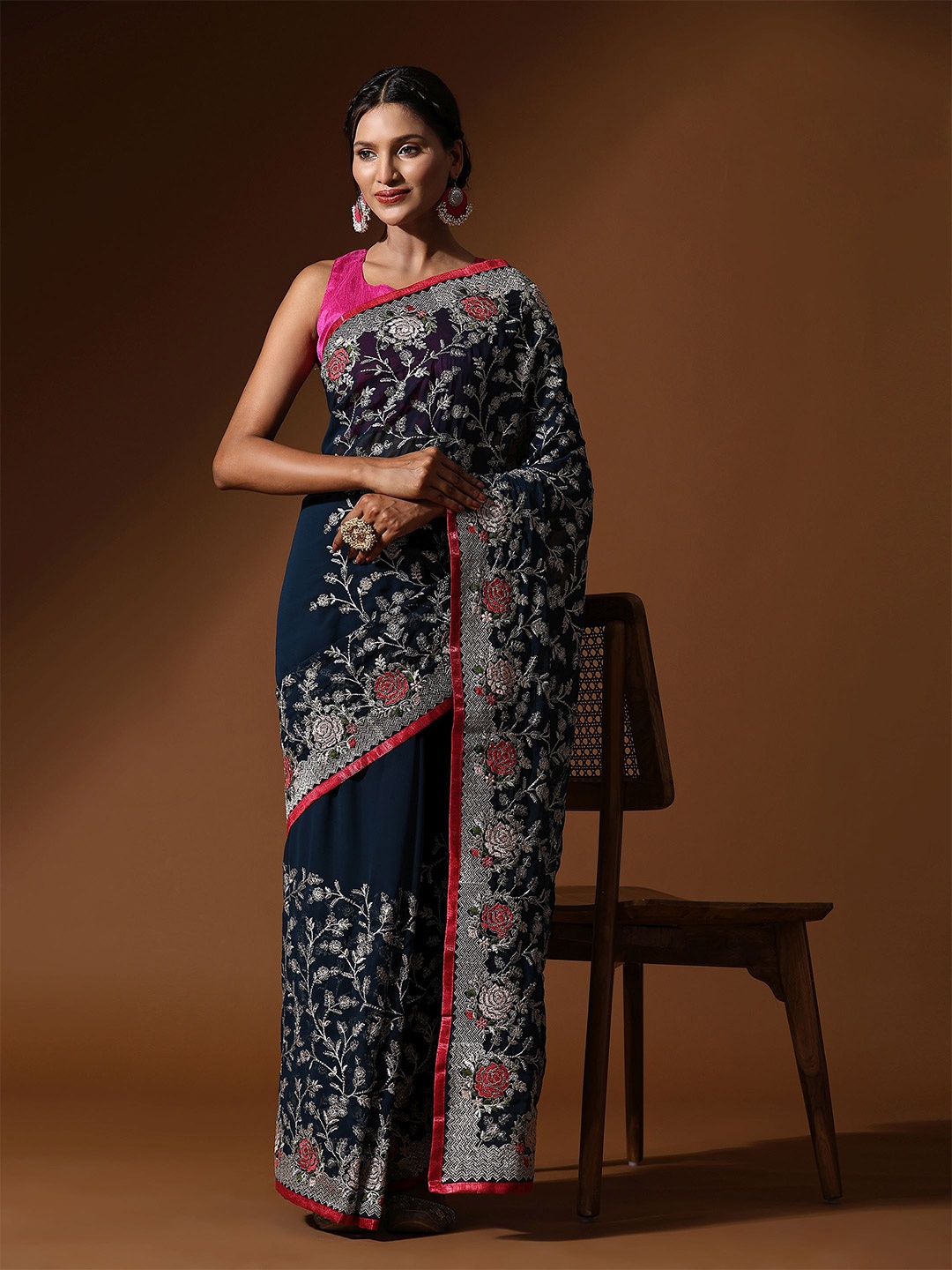 

Vastrasky Global Floral Embroidered Pure Georgette Saree, Navy blue