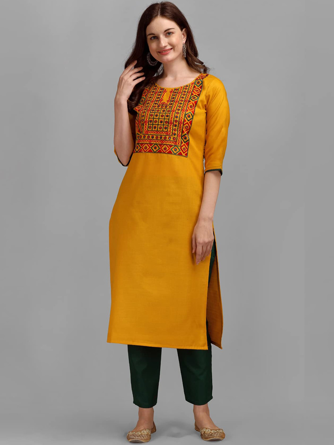 

KALINI Women Yoke Design Regular Thread Work Kurta With Trousers, Yellow