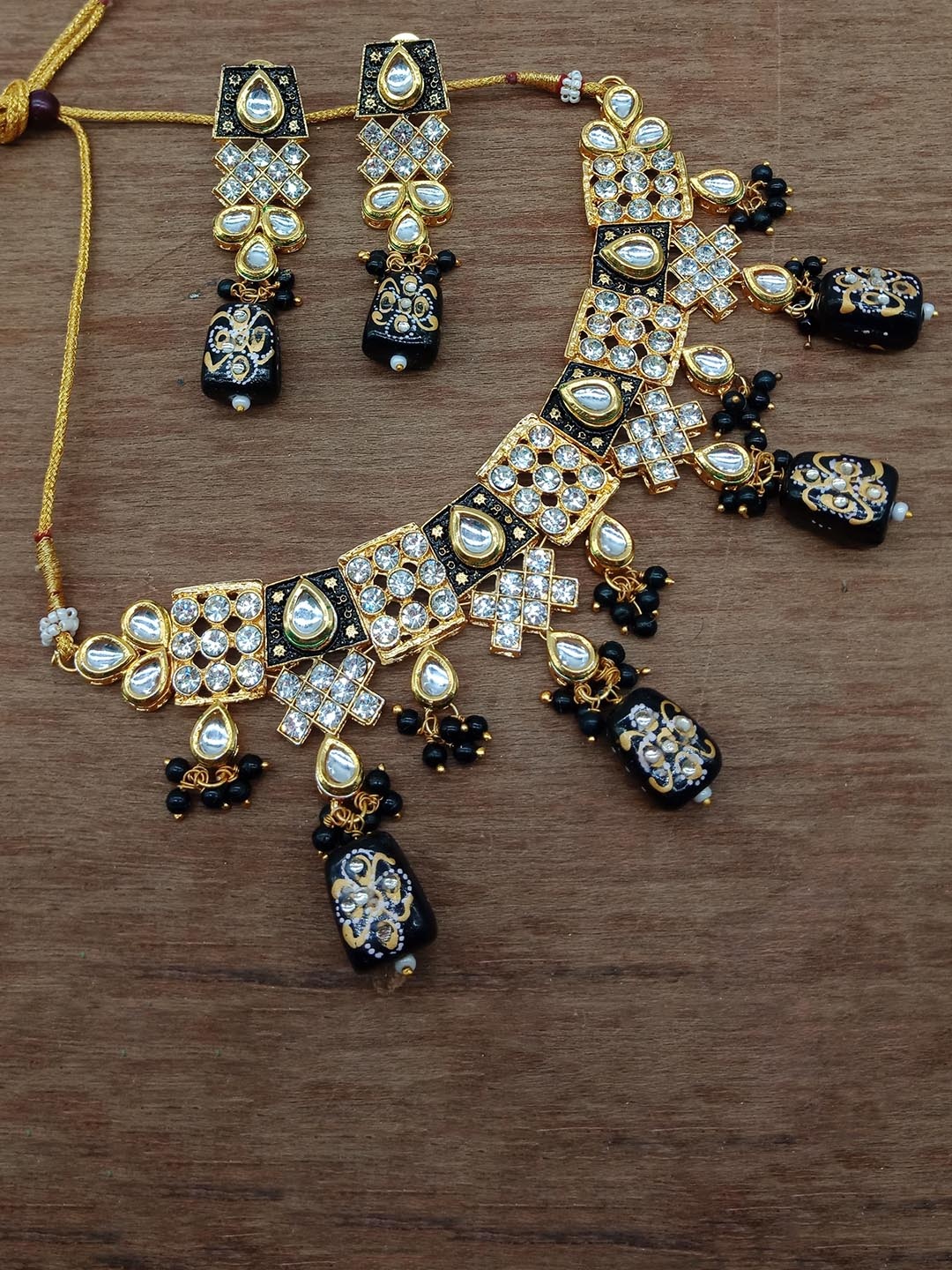 

AASHISH IMITATION Gold-Plated Polki Kundan Jaipuri Drop Jewellery Set, Black