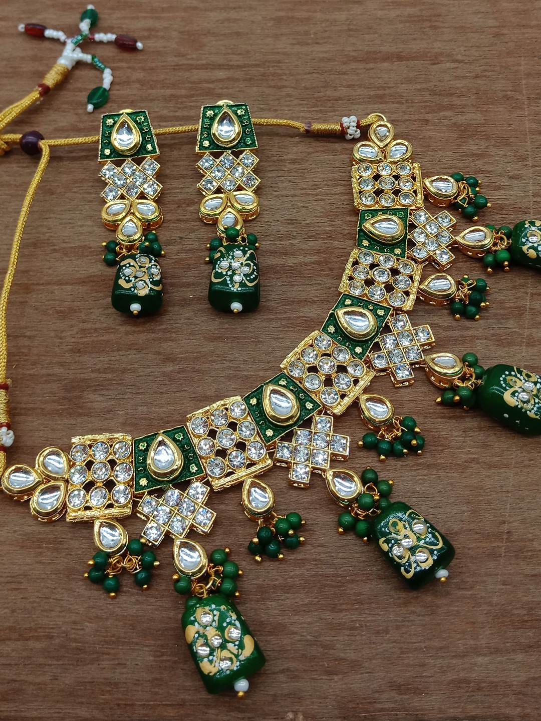 

AASHISH IMITATION Gold Plated Polki Kundan Beaded Jewellery Set