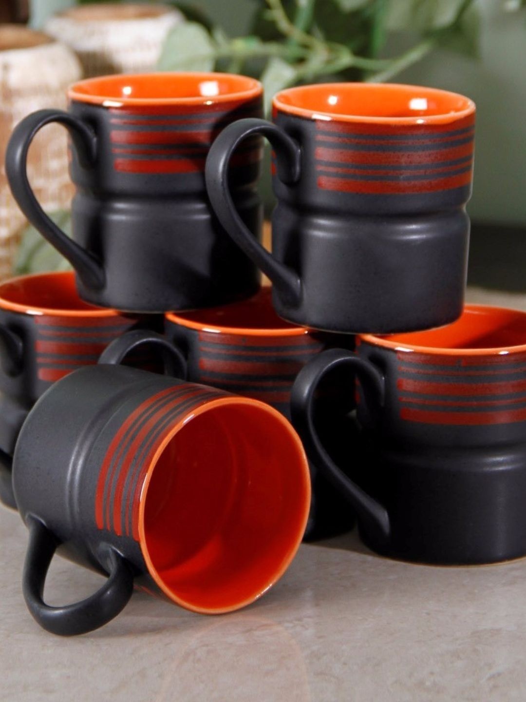 

Unravel India Black & Orange 6-Pieces Solid Stoneware Cups Set
