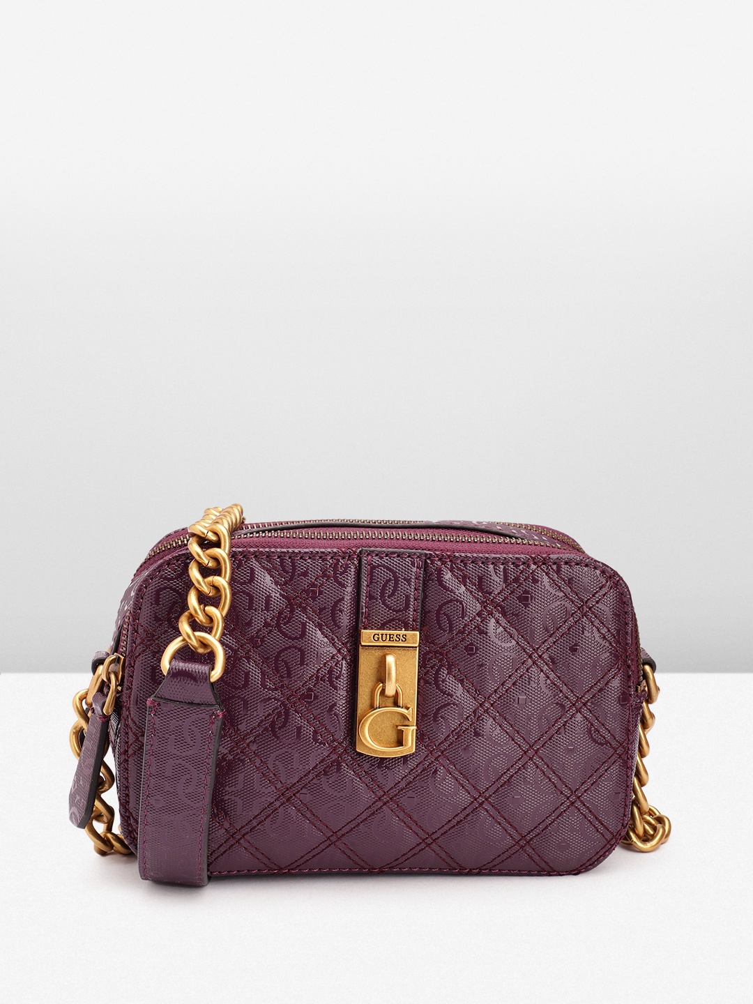 

GUESS Women Brand Logo Printed Structured Sling Bag with Quilted Detail, Purple