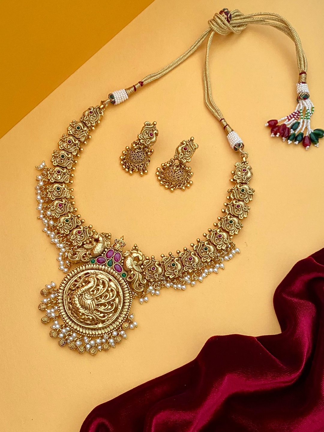 

Pihtara Jewels Gold-Plated Stone-Studded & Beaded Peacock Annapakshi Temple Jewellery Set