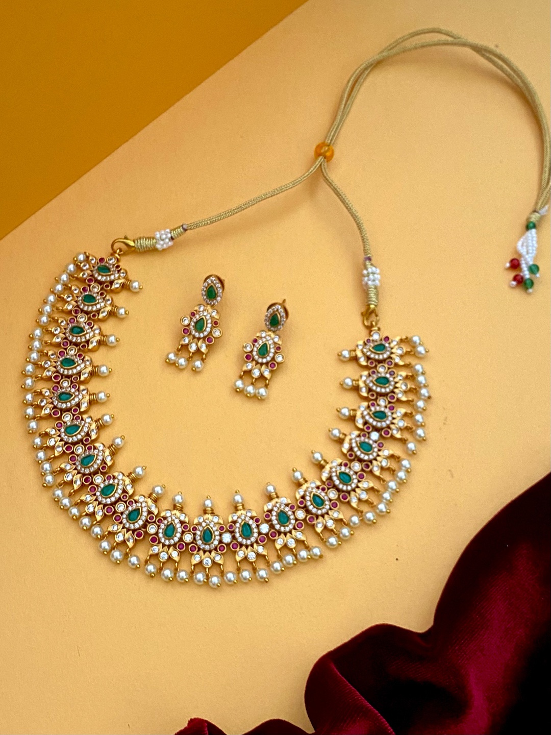 

Pihtara Jewels Gold-Plated Stone-Studded & Beaded Guttapusalu Jewellery Set