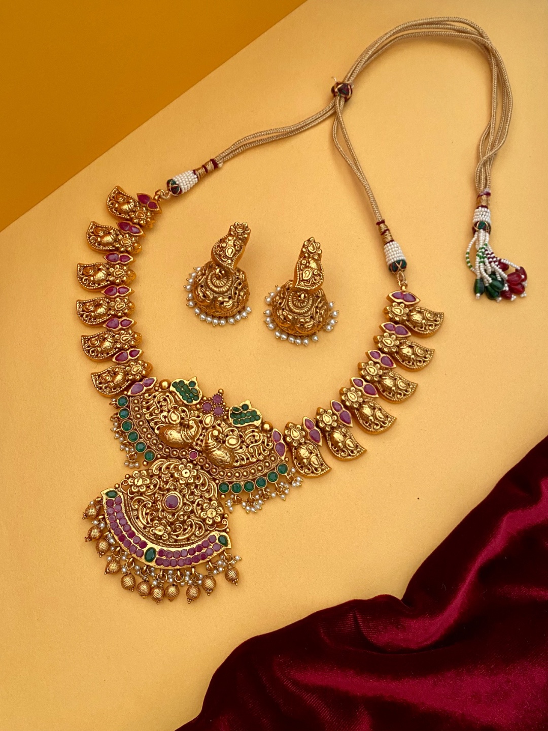 

Pihtara Jewels Gold-Plated Stone-Studded & Beaded Temple Jewellery Set