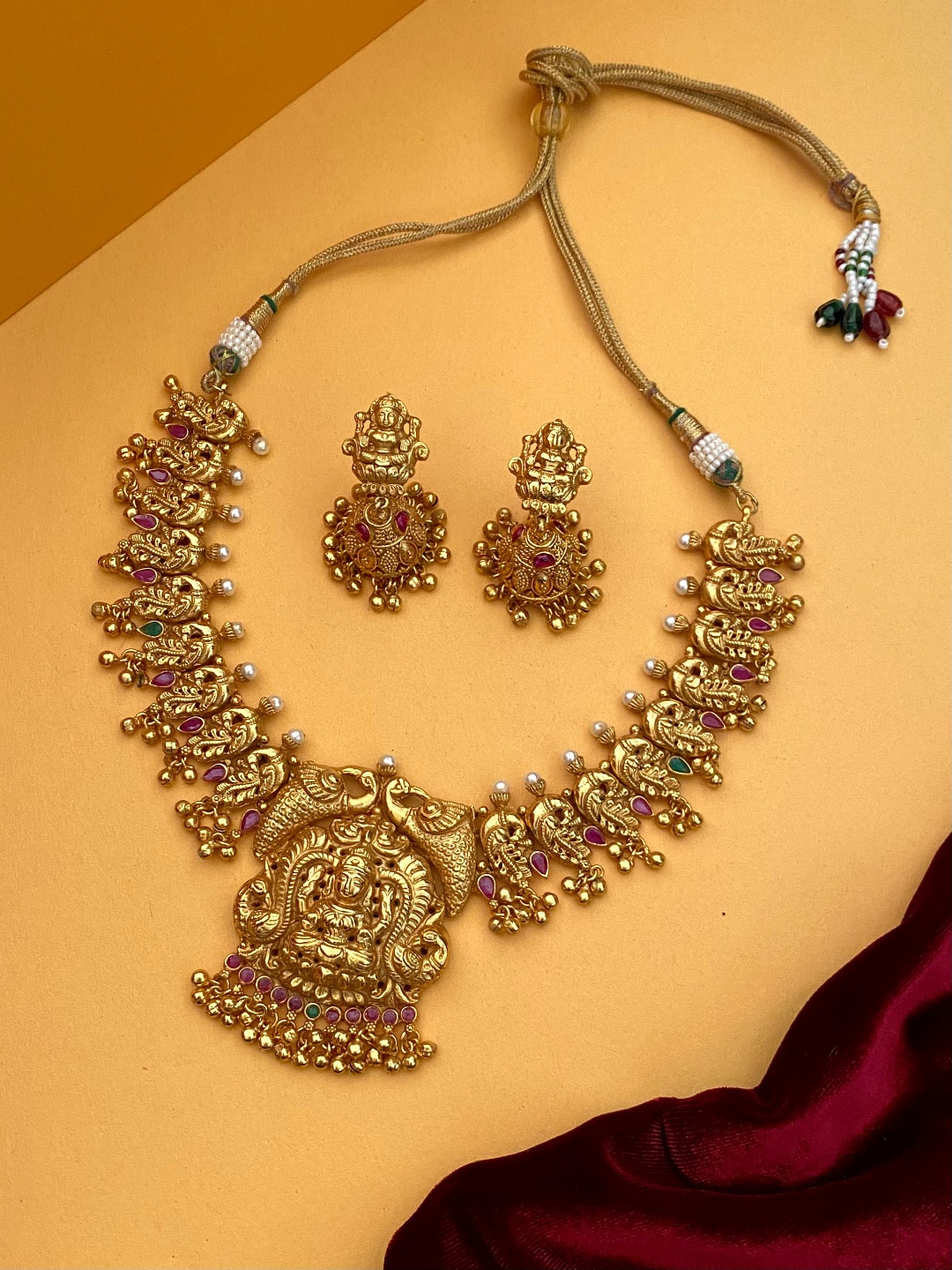 

Pihtara Jewels Gold-Plated Stone-Studded & Beaded Temple Jewellery Set