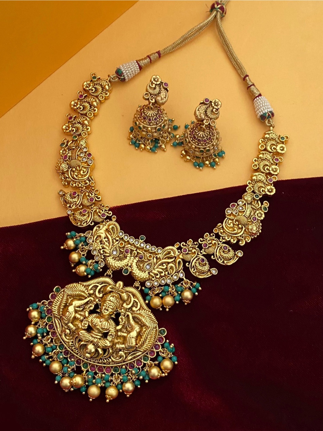 

Pihtara Jewels Gold-Plated Stone-Studded & Beaded Temple Jewellery Set