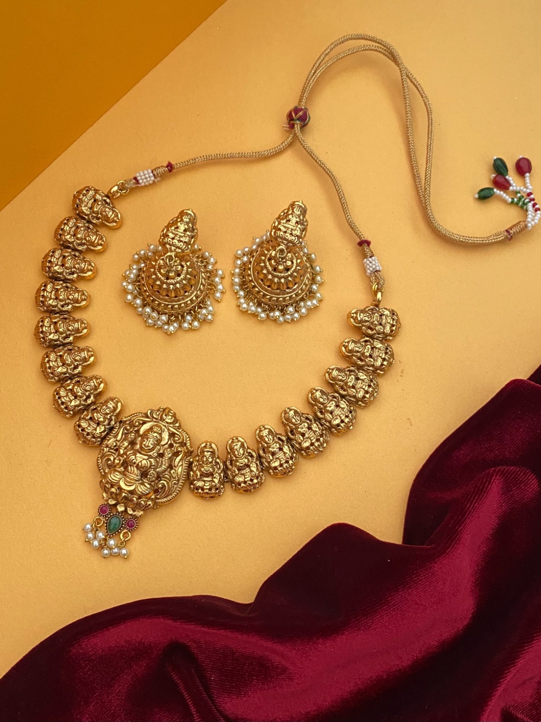 

Pihtara Jewels Gold-Plated Stone-Studded & Pearl Beaded Temple Jewellery Set