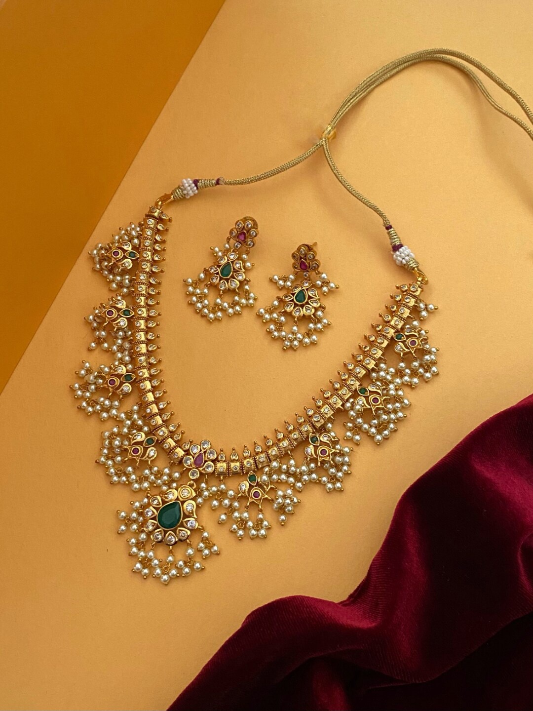 

Pihtara Jewels Gold-Plated Stone-Studded & Pearl Beaded Temple Jewellery Set