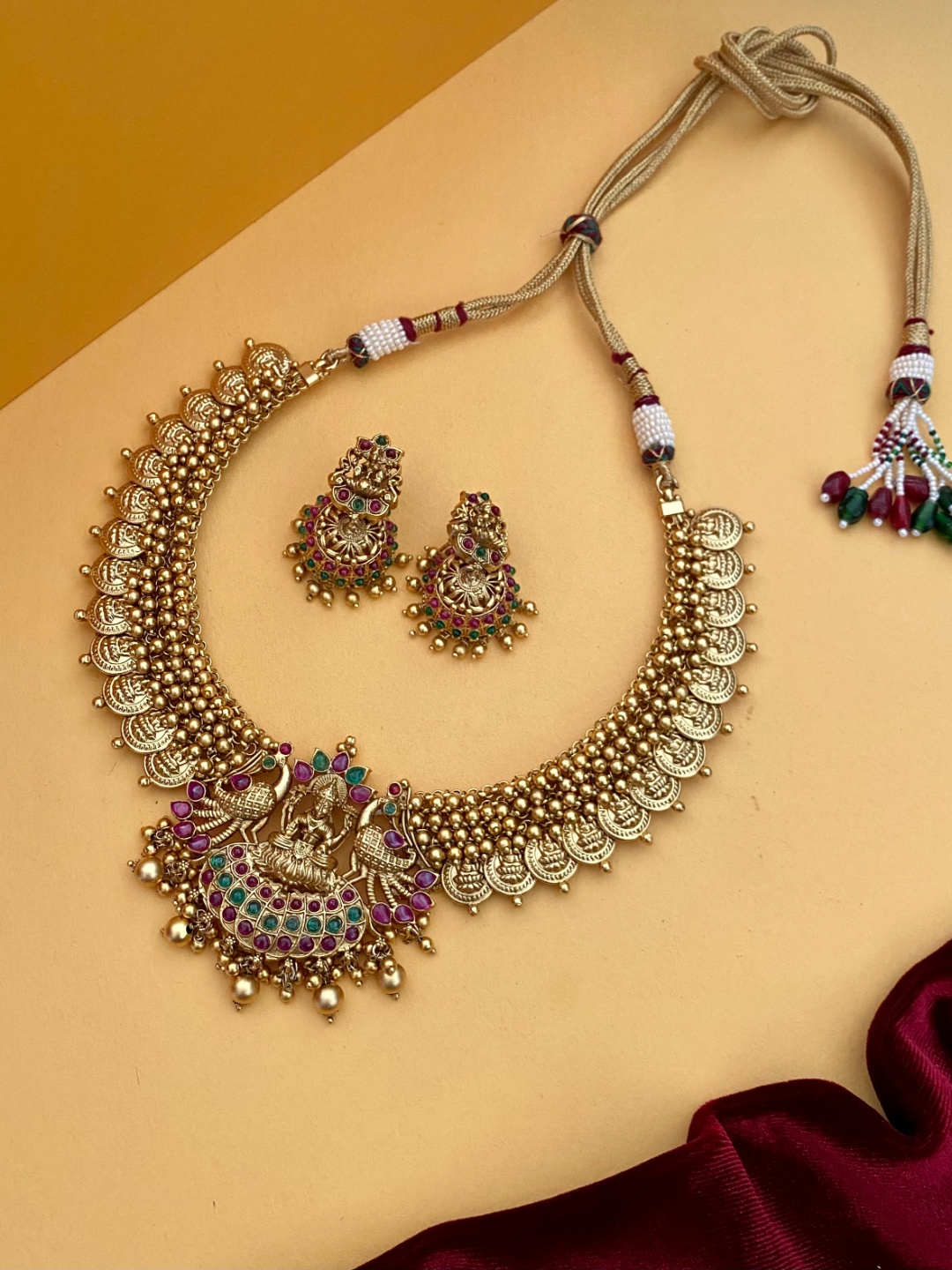 

Pihtara Jewels Gold-Plated Stone-Studded & Beaded Temple Jewellery Set