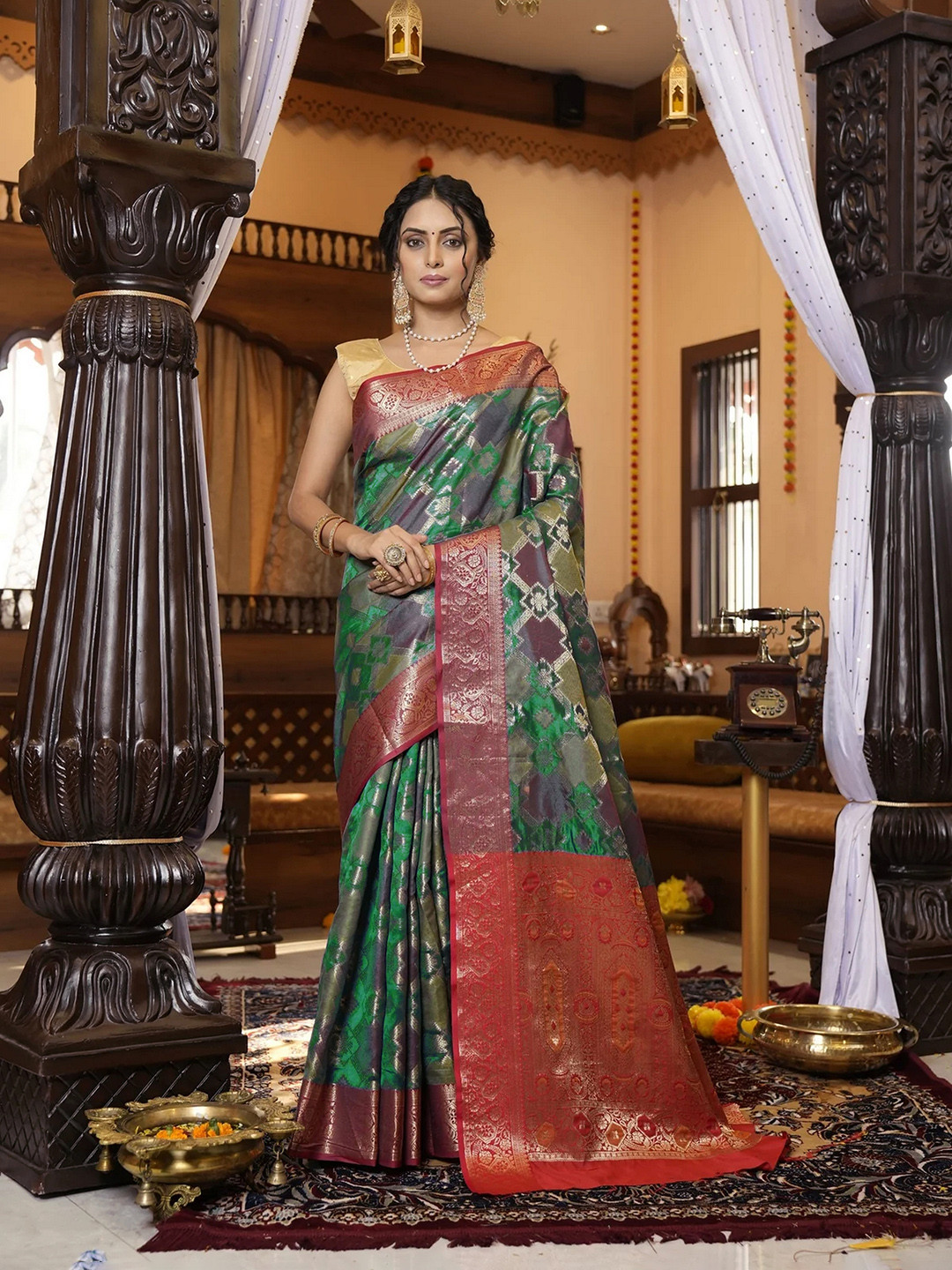 

Mitera Ethnic Motifs Printed Zari Silk Blend Patola Saree, Green