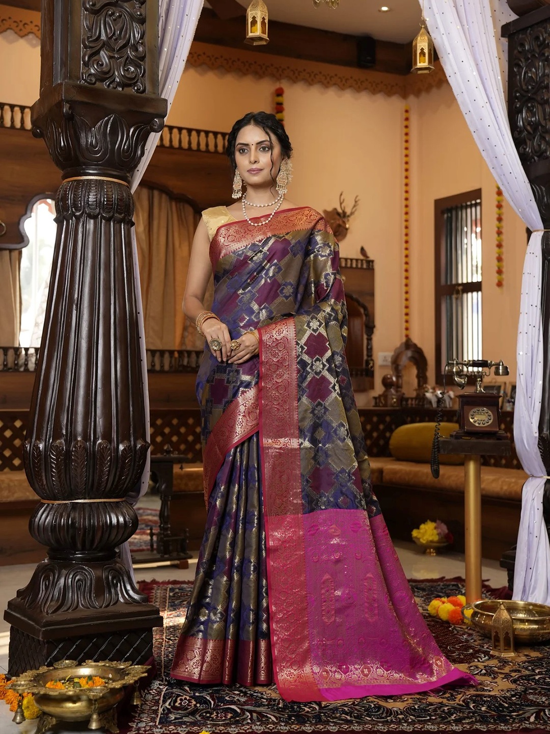 

Mitera Blue & Red Woven Design Zari Silk Blend Patola Saree