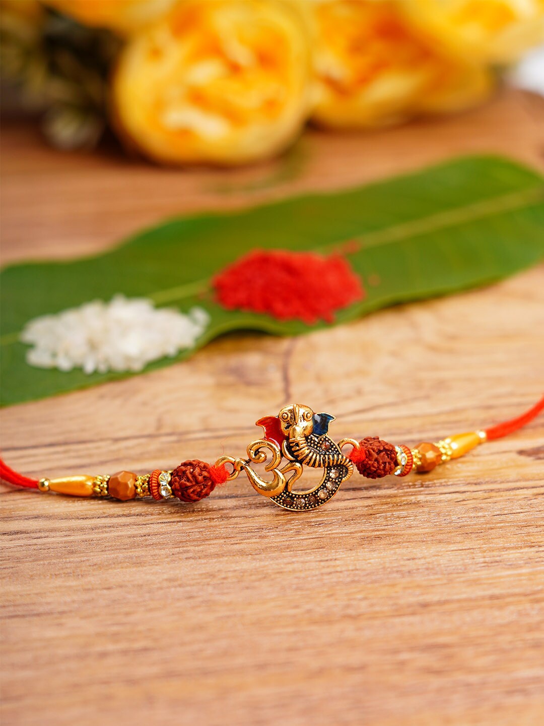 

Urmika Om Shri Ganesh Religious Rakhi, Red