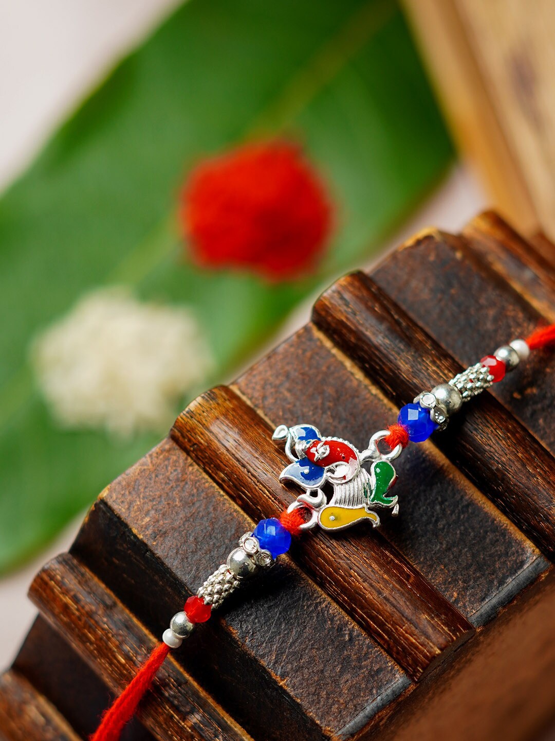 

Urmika Shri Ganesh Colorful Religious Rakhi, Silver