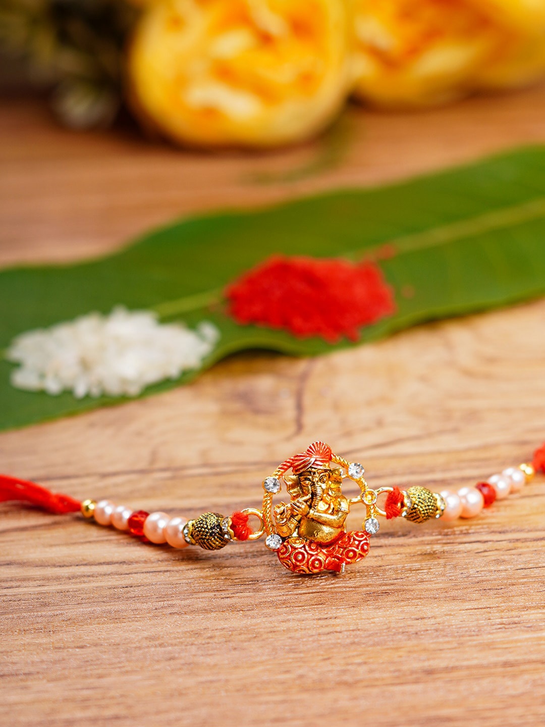 

Urmika Meenakari Ganesha Religious Rakhi, Red