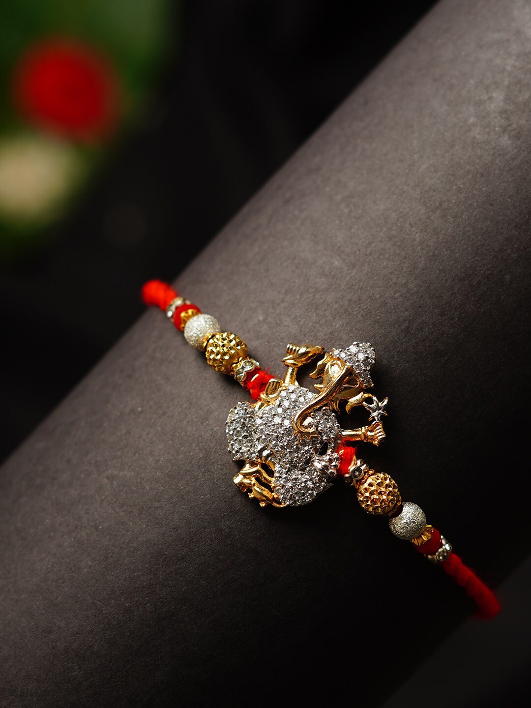 

Urmika Crystal Embellished Shri Ganesh Rakhi, Red