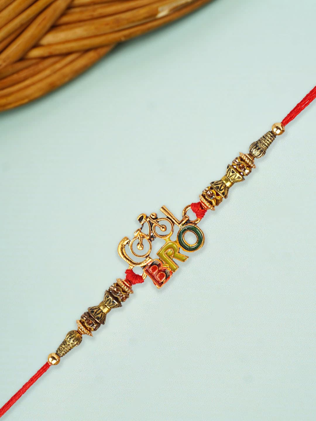 

Urmika Stone-Studded Cool Bro Cycle Motif Rakhi, Red
