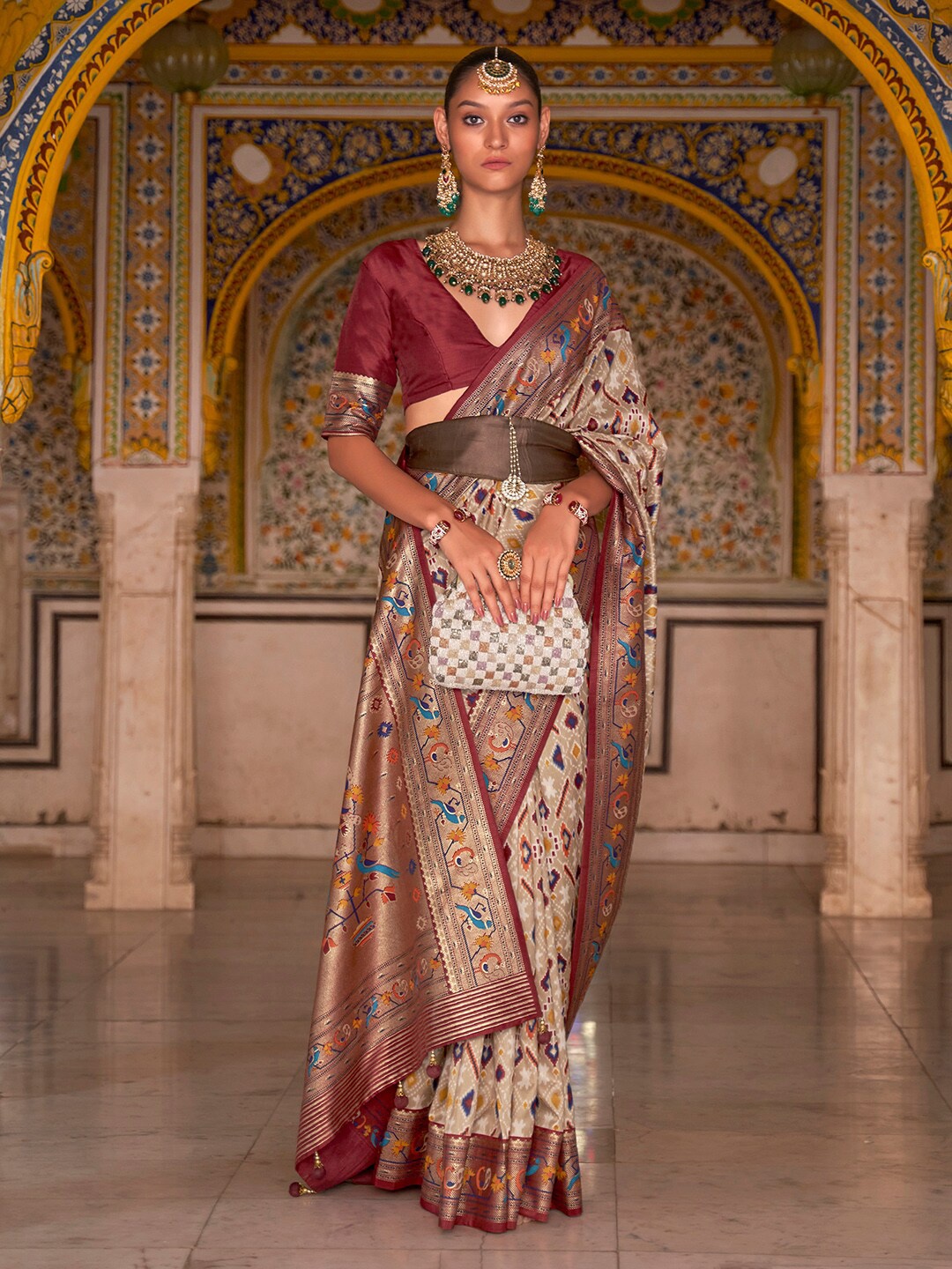 

Anouk Cream-Coloured & Red Ethnic Motifs Printed Zari Patola Saree