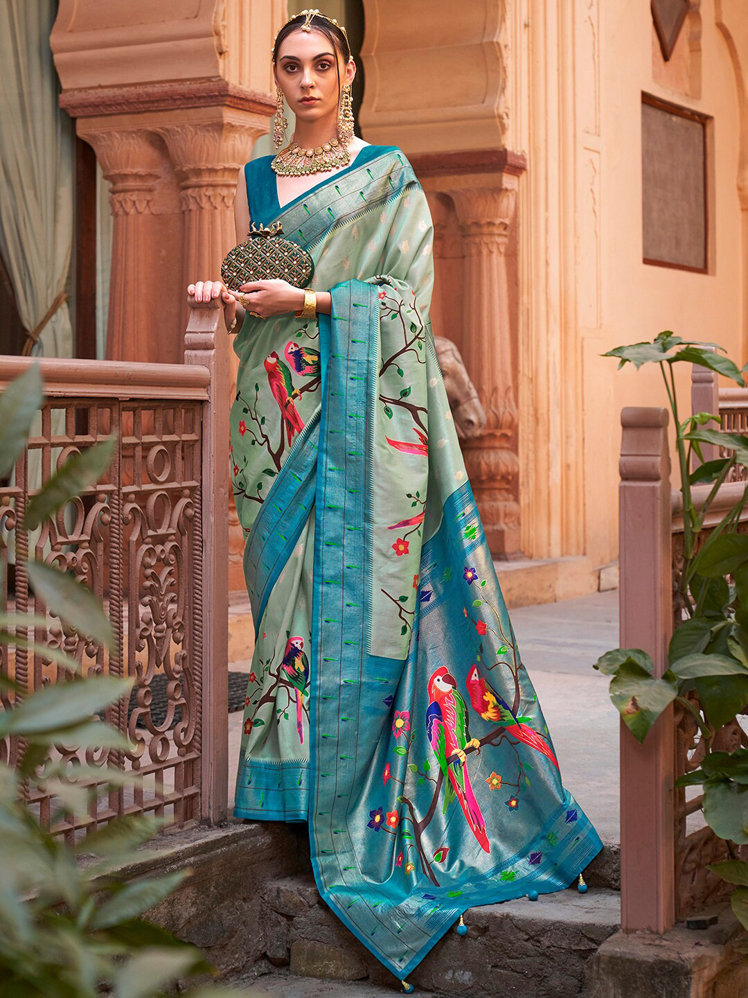 

Anouk Sea Green & Blue Ethnic Motifs Printed Banarasi Saree