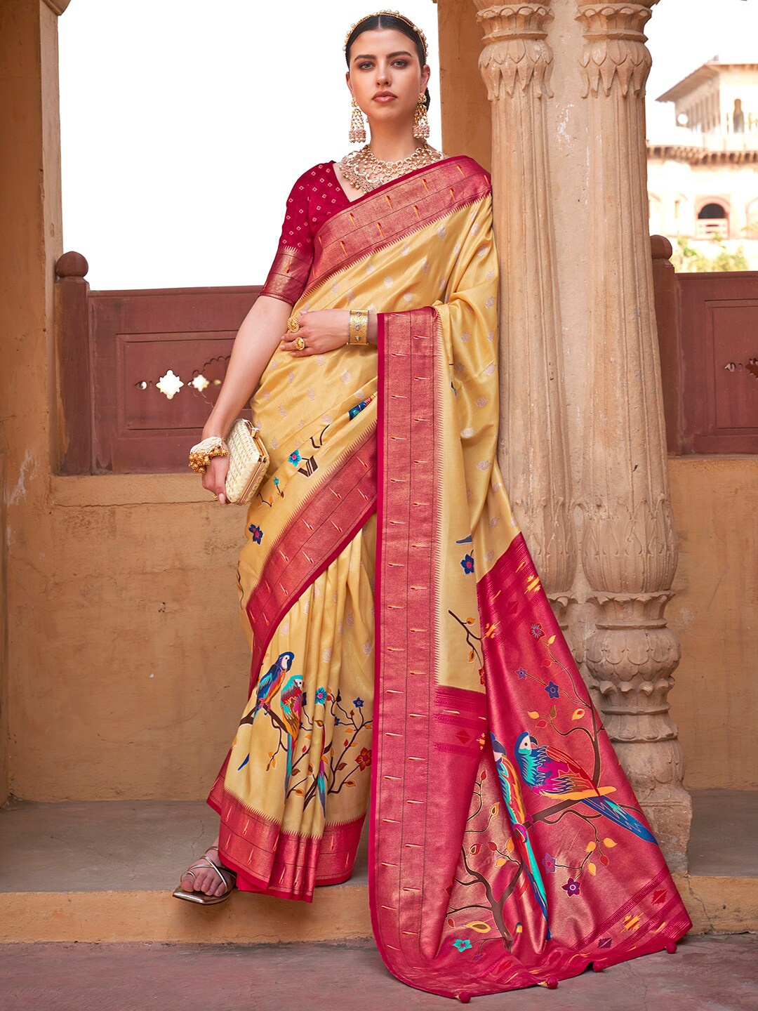 

Anouk Yellow & Magenta Ethnic Motifs Printed Banarasi Saree