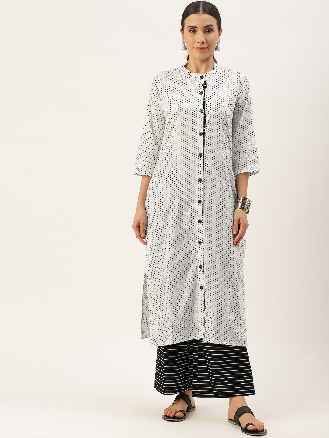 

Saanjh White & Black Geometric Printed Regular Pure Cotton Kurta with Palazzos