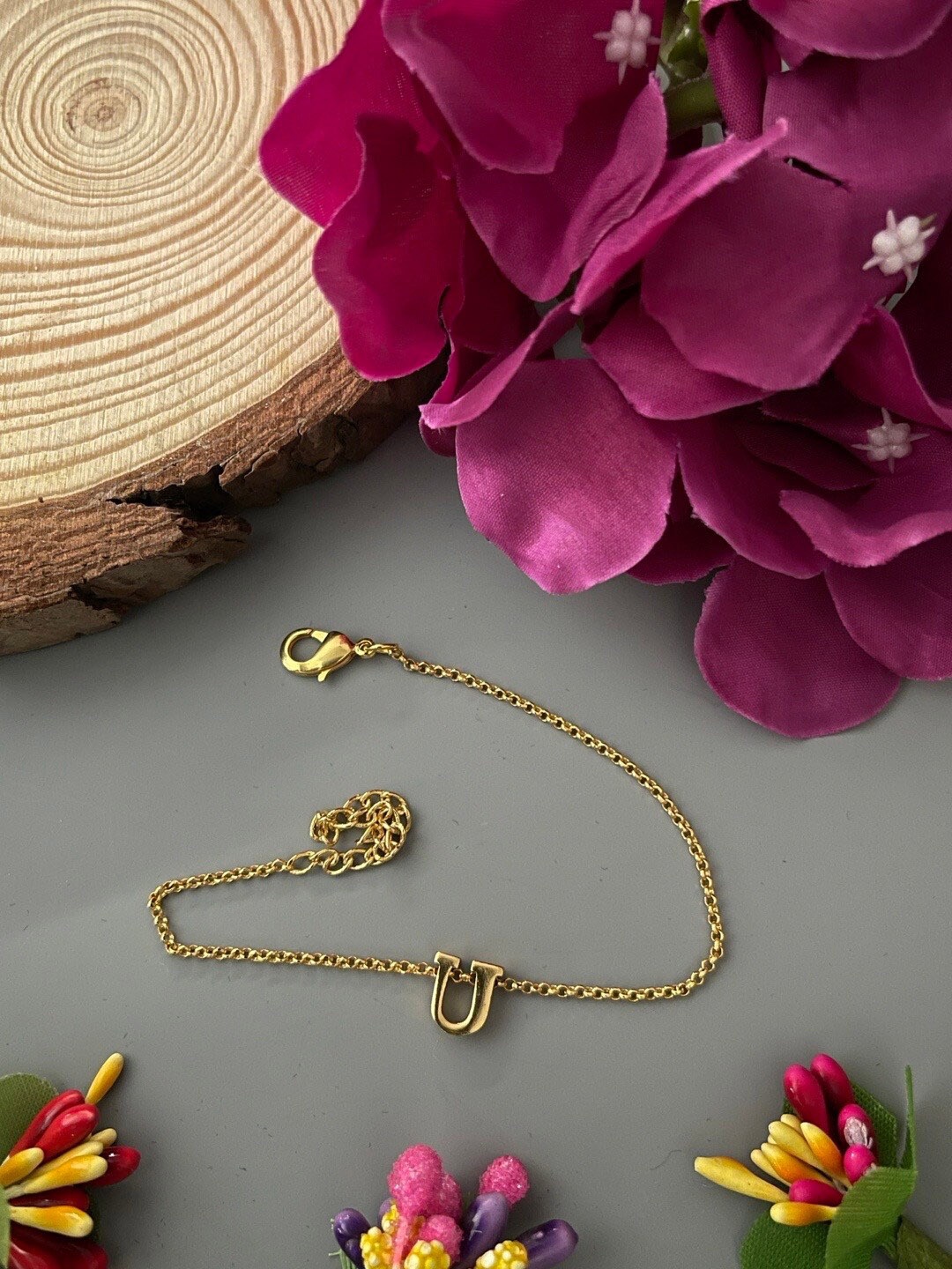 

Digital Dress Room Letter "U" Name Gold Plated Rakhi Bracelet