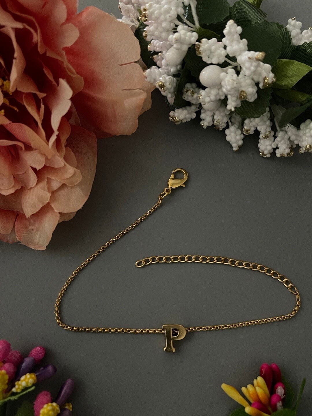 

Digital Dress Room Letter P Rakhi Bracelet, Gold