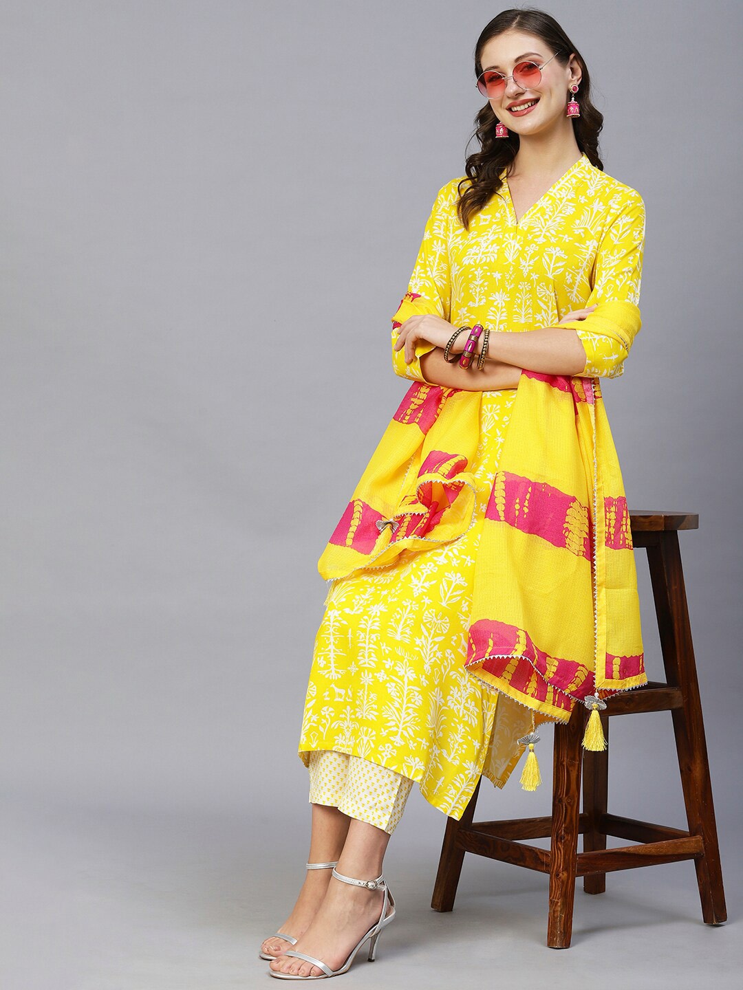 

GoSriKi Ethnic Motifs Printed Regular Kurta with Trousers & Dupatta, Yellow