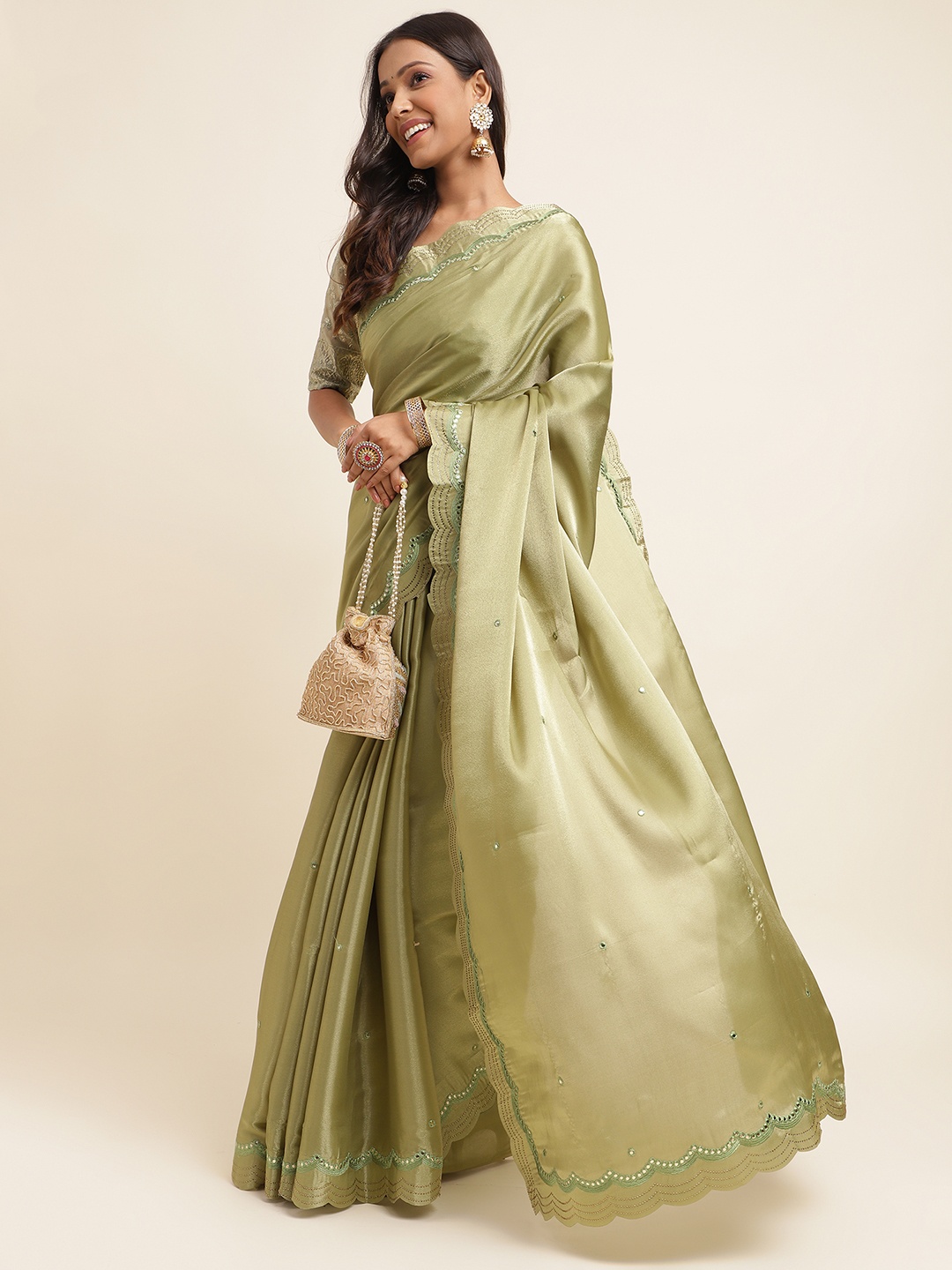 

Mitera Green Embellished Organza Saree